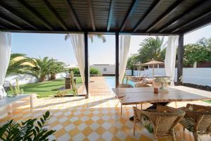 A seating area at UNIQUE Homes Lajares - Only Adults