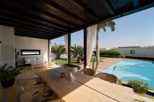 The swimming pool at or close to UNIQUE Homes Lajares - Only Adults