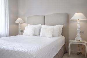 Postel nebo postele na pokoji v ubytování Micra Anglia Boutique Hotel & Spa
