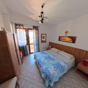 Postel nebo postele na pokoji v ubytování Appartamento Orizzonte Stromboli