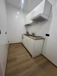 Kuchyň nebo kuchyňský kout v ubytování Hotel Ercoli House + 25 fotografií