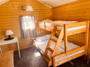 Postel nebo postele na pokoji v ubytování Ylserod Camping