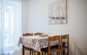 Postel nebo postele na pokoji v ubytování Apartments Kordić