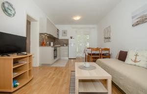 Kuchyň nebo kuchyňský kout v ubytování Apartments Kordić
