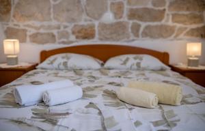 Postel nebo postele na pokoji v ubytování Apartments Kordić