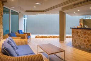 A seating area at Cabot Cap de Mar Spa