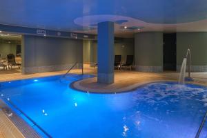 The swimming pool at or close to Cabot Cap de Mar Spa