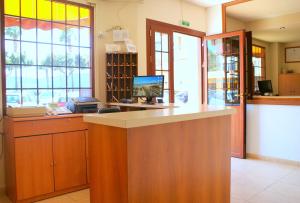 Kuchyň nebo kuchyňský kout v ubytování Hotel Carabela 2
