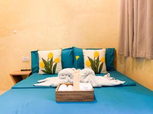 Postel nebo postele na pokoji v ubytování Kalija Homestay