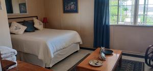 En eller flere senge i et værelse på Lakeview Guesthouse + 20 billeder