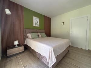 Una cama o camas en una habitación de Vuko i Magdalena Midzor