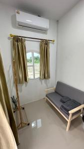 Posezení v ubytování บ้านพักทวีสุข พิซซ่านครสวรรค์รีสอร์ท