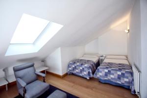 Apartamentos Jauregui客房内的一张或多张床位