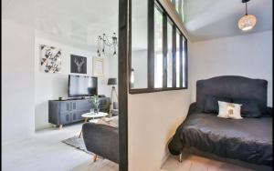 Et tv og/eller underholdning på Havre de paix moderne et central