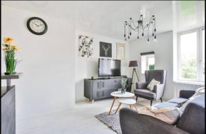 Et tv og/eller underholdning på Havre de paix moderne et central