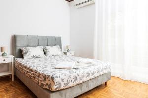Ένα ή περισσότερα κρεβάτια σε δωμάτιο στο Όμορφο διαμέρισμα στην Ξάνθη