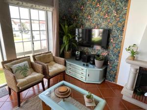 Et opholdsområde på Casa Manu - Beach Apartment