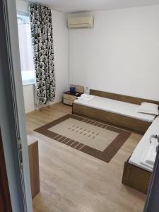 Ένα ή περισσότερα κρεβάτια σε δωμάτιο στο Emona 5 floor 3