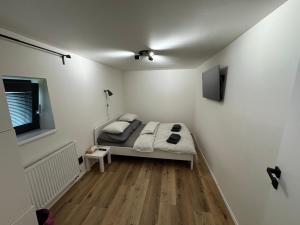 Postel nebo postele na pokoji v ubytování U Paňmamky