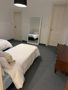 Ένα ή περισσότερα κρεβάτια σε δωμάτιο στο Departamento La Casona
