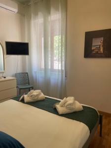 Ένα ή περισσότερα κρεβάτια σε δωμάτιο στο casa Clara