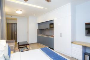 Postel nebo postele na pokoji v ubytování Hotel Livbox at Supernova
