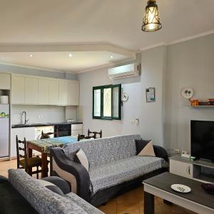 Khu vực ghế ngồi tại Kuqa Rent House