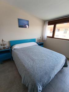 Łóżko lub łóżka w pokoju w obiekcie Pension Doña Lubina