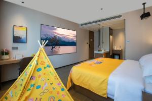 Postel nebo postele na pokoji v ubytování ME Hotel