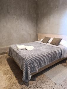 Una cama o camas en una habitación de Taguato