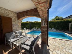 Bazén v ubytování Paradise Villa Cassonni Istria 4 Stars nebo v jeho okolí