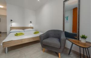 Ένα ή περισσότερα κρεβάτια σε δωμάτιο στο Beach Front Apartment In Povljana
