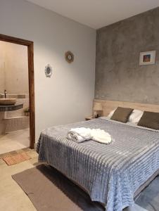 Una cama o camas en una habitación de Taguato