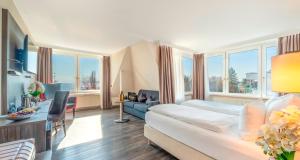 Postel nebo postele na pokoji v ubytování PLAZA Hotel Buchhorner Hof