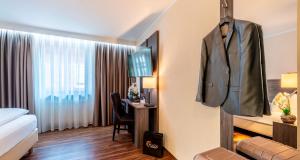 Postel nebo postele na pokoji v ubytování PLAZA Hotel Buchhorner Hof