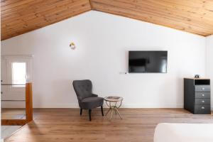 TV a/nebo společenská místnost v ubytování Dúplex Deluxe Apartment