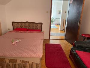 Voodi või voodid majutusasutuse Apartman 1 toas