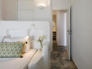 A bed or beds in a room at Tinostra Casa