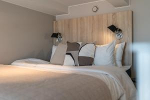 Unity Helsinki - A Studio Hotel客房内的一张或多张床位