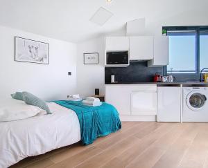 Kuchyň nebo kuchyňský kout v ubytování Bel appartement central - Sweet Home