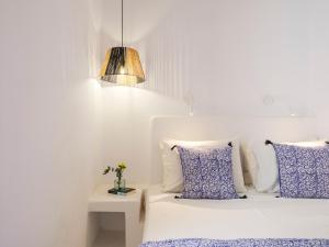 A bed or beds in a room at Tinostra Casa