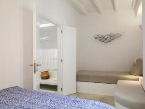 A bed or beds in a room at Tinostra Casa