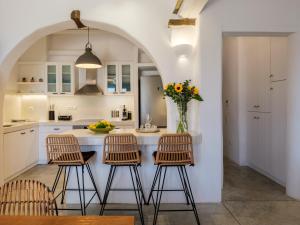 A kitchen or kitchenette at Tinostra Casa
