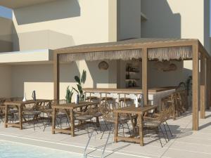 Patio lub wspólna przestrzeń na świeżym powietrzu w obiekcie Τhe Noverian Antama Organic Beach Resort Chania