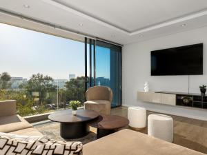 Et tv og/eller underholdning på The Warwick: Luxury secure apartment in Greenpoint