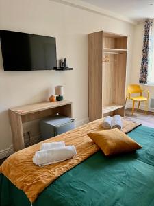 Letto o letti in una camera di Armor Hotel