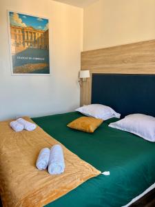 Letto o letti in una camera di Armor Hotel