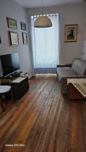 TV a/nebo společenská místnost v ubytování RESIDENZA CarloMaria