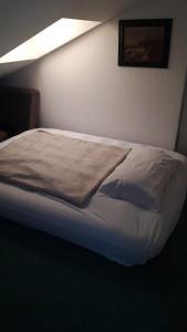 Postel nebo postele na pokoji v ubytování RESIDENZA CarloMaria
