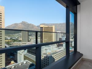 a view of the city from a building at The Rubik: Luxury secure apartment in Cape Town in Cape Town +6 photos